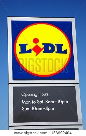 Llanelli, Wales, UK - May 8, 2017:  Lidl logo advertising sign at its retail supermarket stores in just outside the town centre