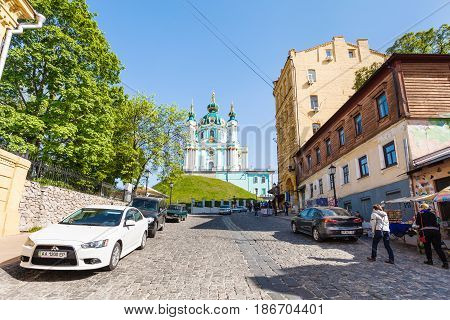 People On Andriyivskyy Descent And View Of Church