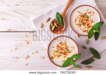 Traditional Indian Lassi Curd With Cardamon, Mint And Saffron