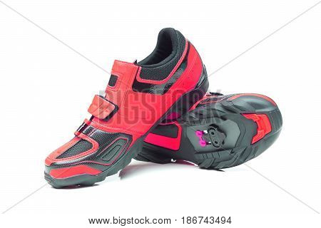 Mountain bike cycling shoes in red color isolated