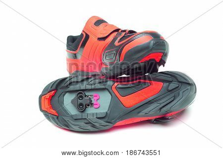 Mountain bike cycling shoes in red color isolated