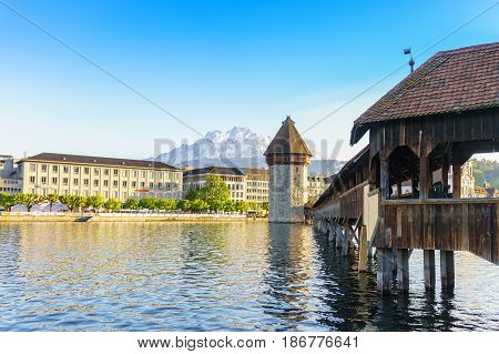 Lucerne Switzerland - April 30 2017: Historic city center of Lucerne with Famous Chapel bridge and Lake Lucerne on April 30 2017 in Lucerne Switzerland.