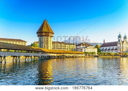 Lucerne Switzerland - April 30 2017: Historic city center of Lucerne with Famous Chapel bridge and Lake Lucerne on April 30 2017 in Lucerne Switzerland.