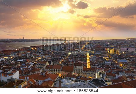 The central part of Lisbon overlooking the Tagus river in the setting sun Portugal