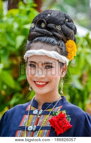 NAKORN PHANOM THAILAND - FEBRUARY 14 2015: Thai northeastern dancer with traditional costume in Phutai world event day in Renunakorn of Nakorn Phanom Thailand