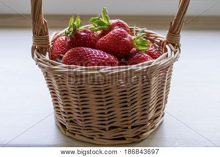 Strawberry In A Basket On A White Background