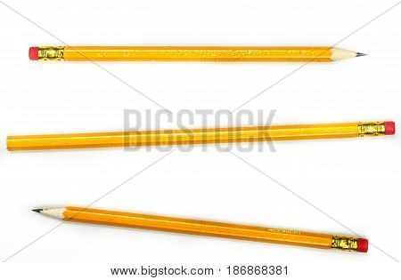 Pencil writing instrument writing utensil drawing tool eraser isolated on white sharpened