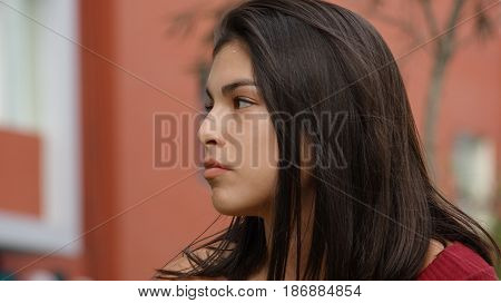 A Close Up of a Serious Teen Girl