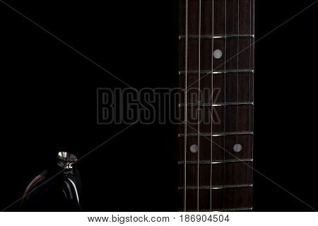Music And Art. Electric Guitar On A Black Isolated Background. Horizontal Frame