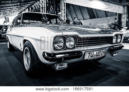STUTTGART GERMANY - MARCH 03 2017: Mid-size sports car Ford Capri RS2600 1974. Black and white. Stylization. Europe's greatest classic car exhibition 