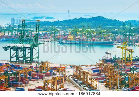 View of Singapore cargo port full of conteiners.
