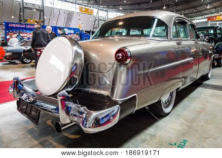 STUTTGART GERMANY - MARCH 03 2017: Mid-size luxury car Ford Mainline 1953. Rear view. Europe's greatest classic car exhibition 