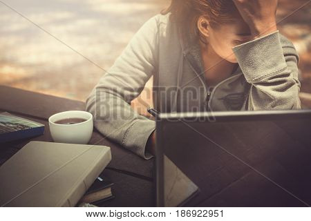 Woman working in a natural garden on vacation.