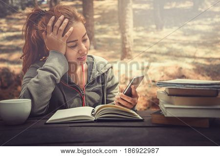 Woman working in a natural garden on vacation.