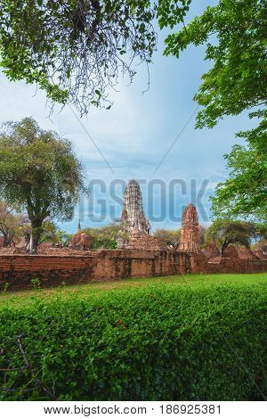 Ruins Of Buddha Statues And Pagoda Of Wat Ratcha Burana In Ayutthaya Historical Park, Thailand