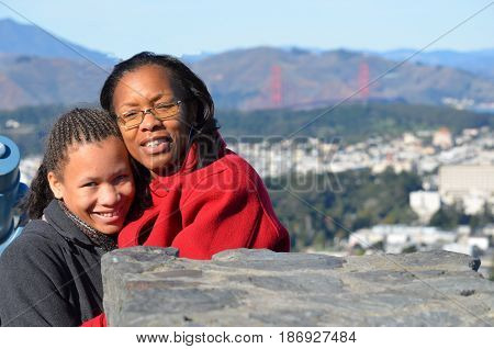 Mother an Daughter At view point in San Francisco over looking Golden Gate Bridge