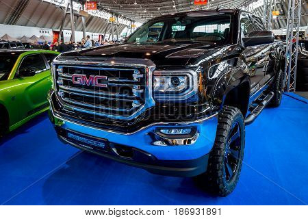 STUTTGART GERMANY - MARCH 03 2017: Heavy-Duty pickup truck GMC Sierra 1500 Crew Cab SLT 2017. Europe's greatest classic car exhibition 