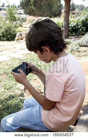 Little Boy With Mobile Device