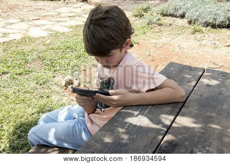 Little Boy With Mobile Device