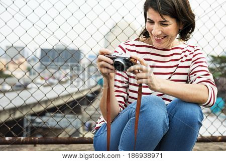 Woman traveler photographer holiday lifestyle trip