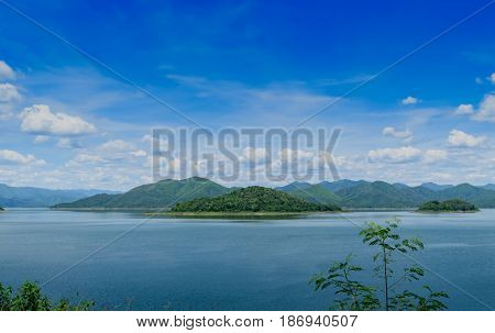 Panorama view of mountain terrain in the dam with clear blue sky background peace and relaxation concept.