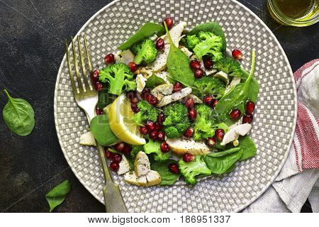 Vegetable Green Salad With Chicken And Pomegranate.top View.