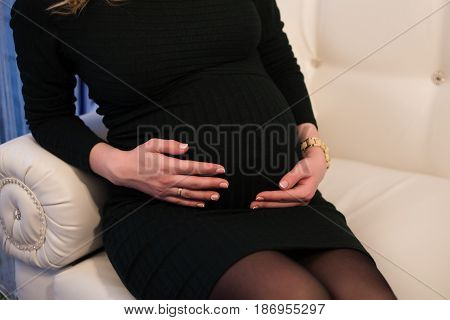 pregnancy, business, stress, gestosis and work concept - pregnant businesswoman feeling sick at office work