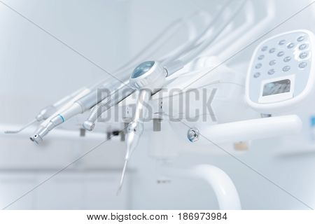Masters tools. Cool modern nice devices for specific procedures lining up on a panel board and being all clean and sterile