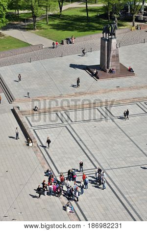 VILNIUS - MAY 16: Unidentified people visit Cathedral Square in Vilnius on May 16 2017 in Vilnius Lithuania. The Cathedral Square in Vilnius is the main square of the Vilnius Old Town