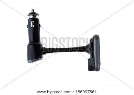 Mp3 Fm transmitter with remote control isolated on white background. It plays mp3, you listen on fm channel on car radio.