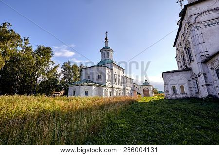 Old Orthodox Church At Village. Summer View With Floral Meadow.