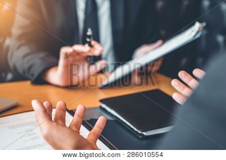 Job Interview Concept , Senior Manager Reading A Resume During A Job Interview Employee Young Man Me