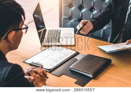 Job Interview Concept , Senior Manager Reading A Resume During A Job Interview Employee Young Man Me
