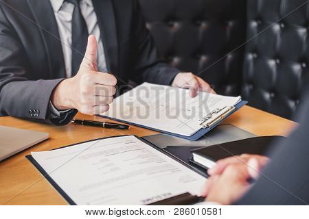 Job Interview Concept , Senior Manager Reading A Resume During A Job Interview Employee Young Man Me