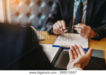 Job Interview Concept , Senior Manager Reading A Resume During A Job Interview Employee Young Man Me