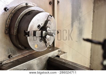 Spindle Chuck And Installed Metal Part On High Precision Cnc Industrial Lathe Turning Machine. Close