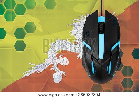 Bhutan Flag  And Computer Mouse. Concept Of Country Representing E-sports Team