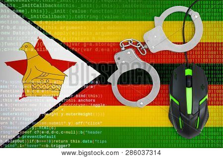 Zimbabwe Flag  And Handcuffed Computer Mouse. Combating Computer Crime, Hackers And Piracy