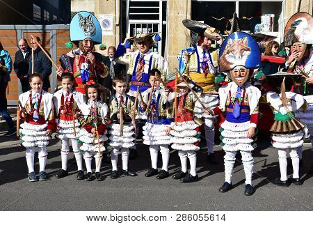 Verin, Spain, 24 Feb 2019. Famous Carnival And Street Parade With Cigarrons Costumes. Ourense Provin