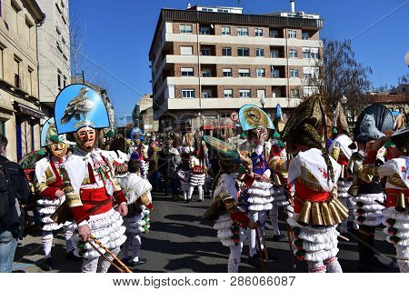 Verin, Spain, 24 Feb 2019. Famous Carnival And Street Parade With Cigarrons Costumes. Ourense Provin