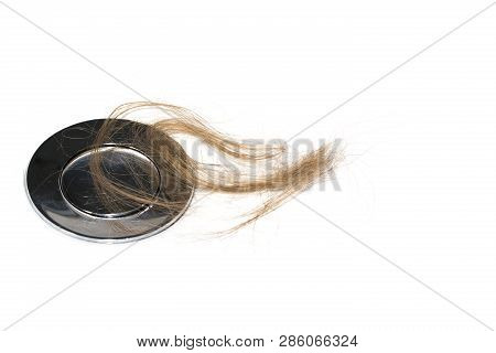 Hair Loss On Washbasin. Long Brown Hair On White Basin In The Bathroom. Healthcare Concept