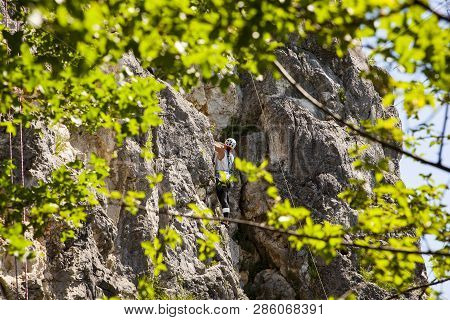 Doberdo, Italy - April, 22: View Of A Passionate Female Climber On Doberdo Crag On April 22, 2018