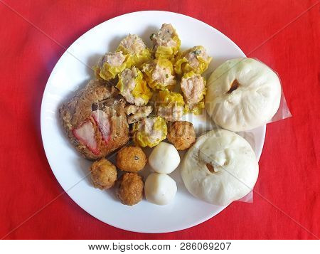 Chinese Food Style, Top View Of Pork Chinese Steamed Dumpling (shumai), Pork Bun, Shrimp Ball And St
