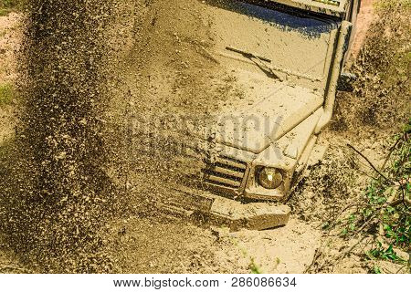 Track On Mud. 4x4 Off-road Suv Car. Offroad Car. Safari. Mud And Water Splash In Off-road Racing. 4x