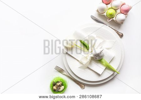 Easter Dinner. Table Setting With White Tulip On White Table. Top View.