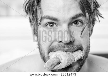 Handsome Young Man Enjoying His Morning Cup Of Coffee Laying In Bed Hotel Room Happy Smiling. Handso