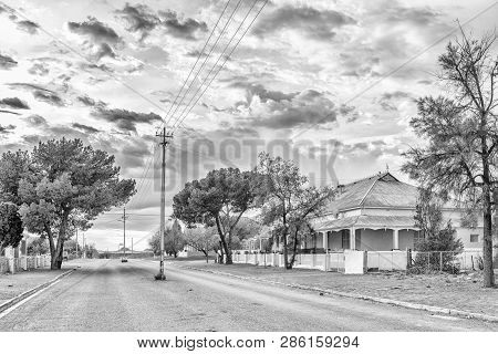 Carnavon, South Africa, September 1, 2018: An Early Morning Street Scene, With Historic Houses, In C