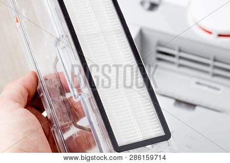 Hepa Filter  For Vacuum Cleaner. New Hepa Filter In Hand Close-up.