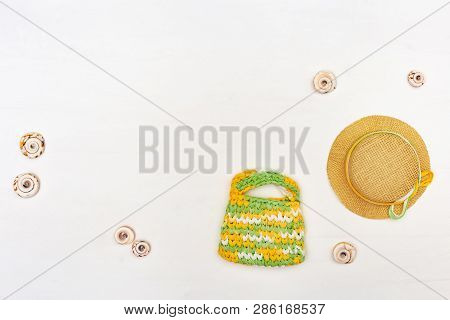 Summer Items - Sun Hat, Bag, Towel On White Background. Summer Concepts. Copy Space.