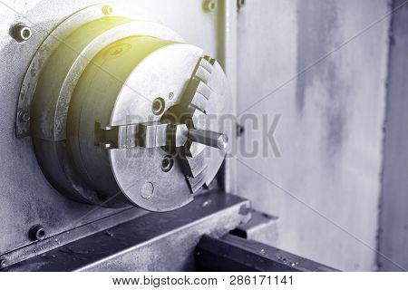 Spindle Chuck And Installed Metal Part On High Precision Cnc Industrial Lathe Turning Machine. Close